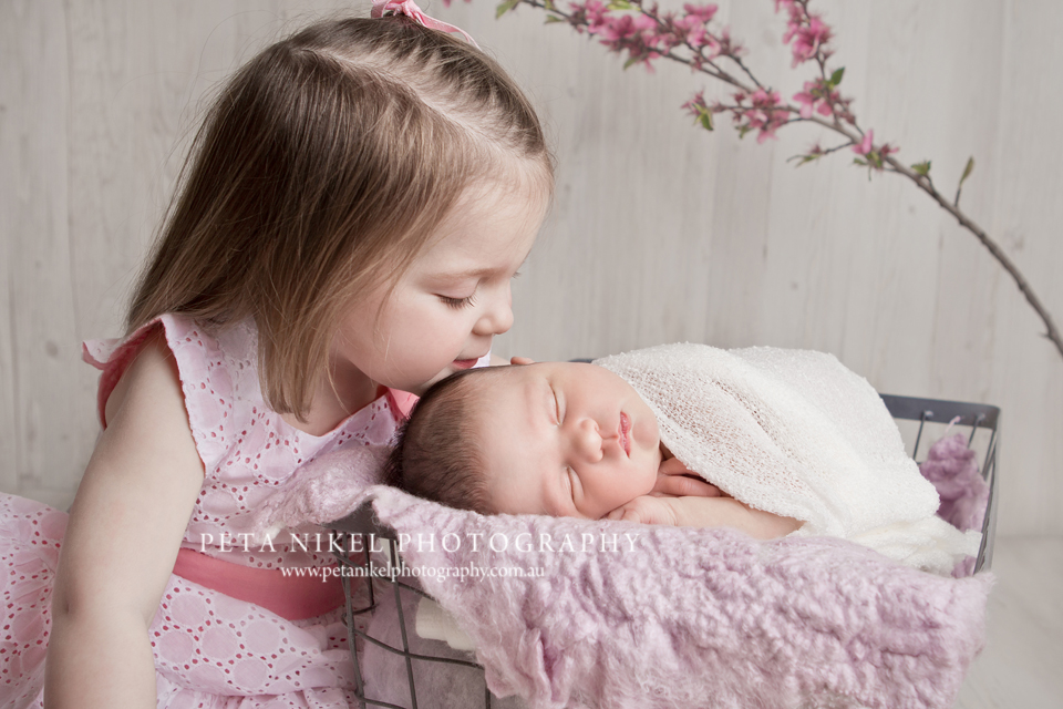 Newborn photo with sibling Hobart Photographer